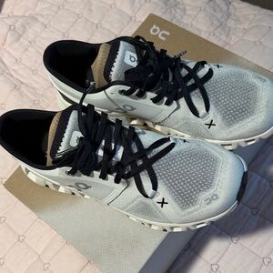 On Running Black and White Athletic Shoes